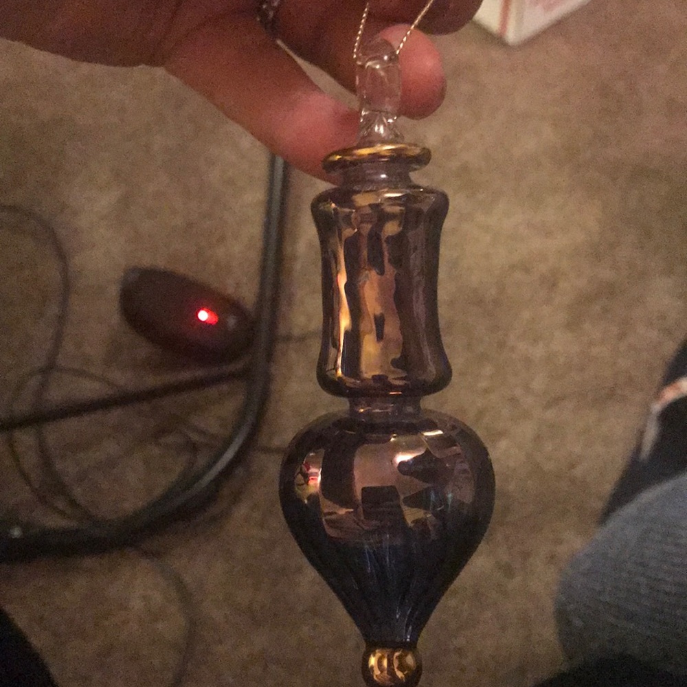 Blown glass ornament. Iridescent glass.